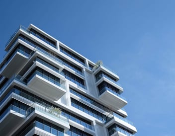 Blue-sky-building-Mobile-1284-1000